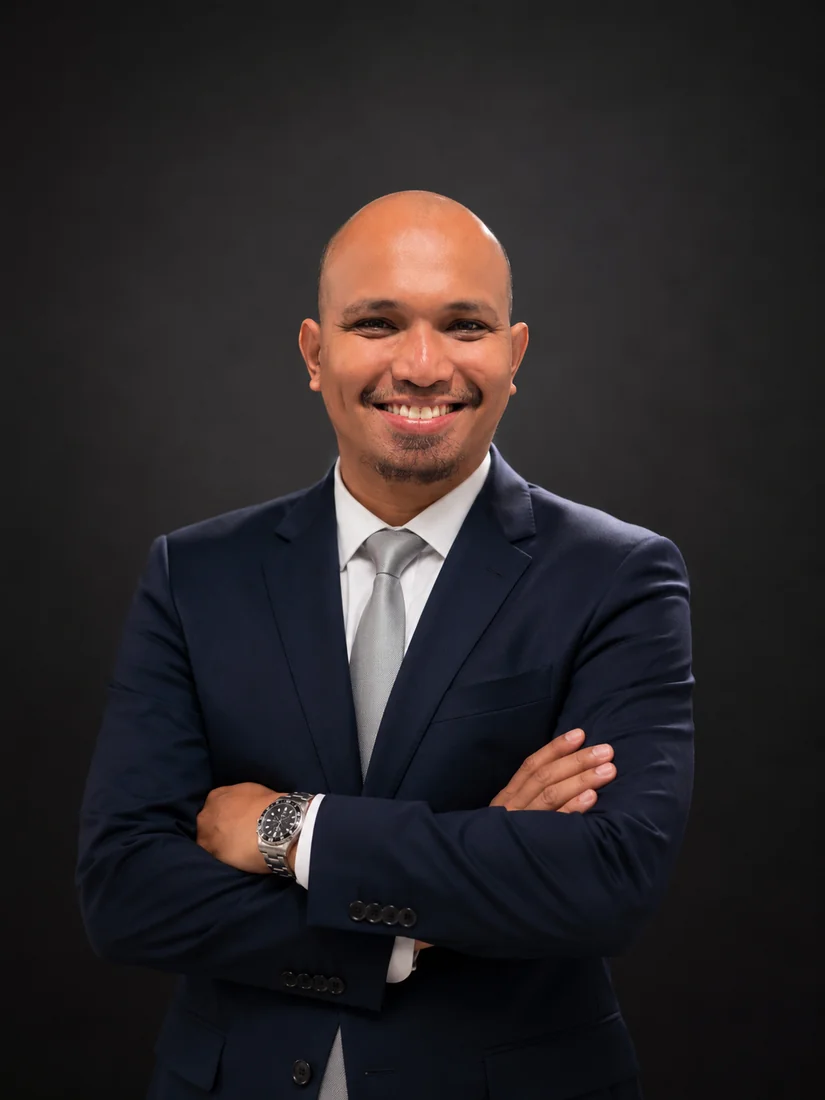 Randdy Krisoktavius Tanesib, S.Psi. — Direktur Utama